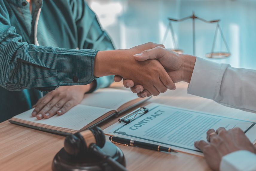handshake between attorney and client