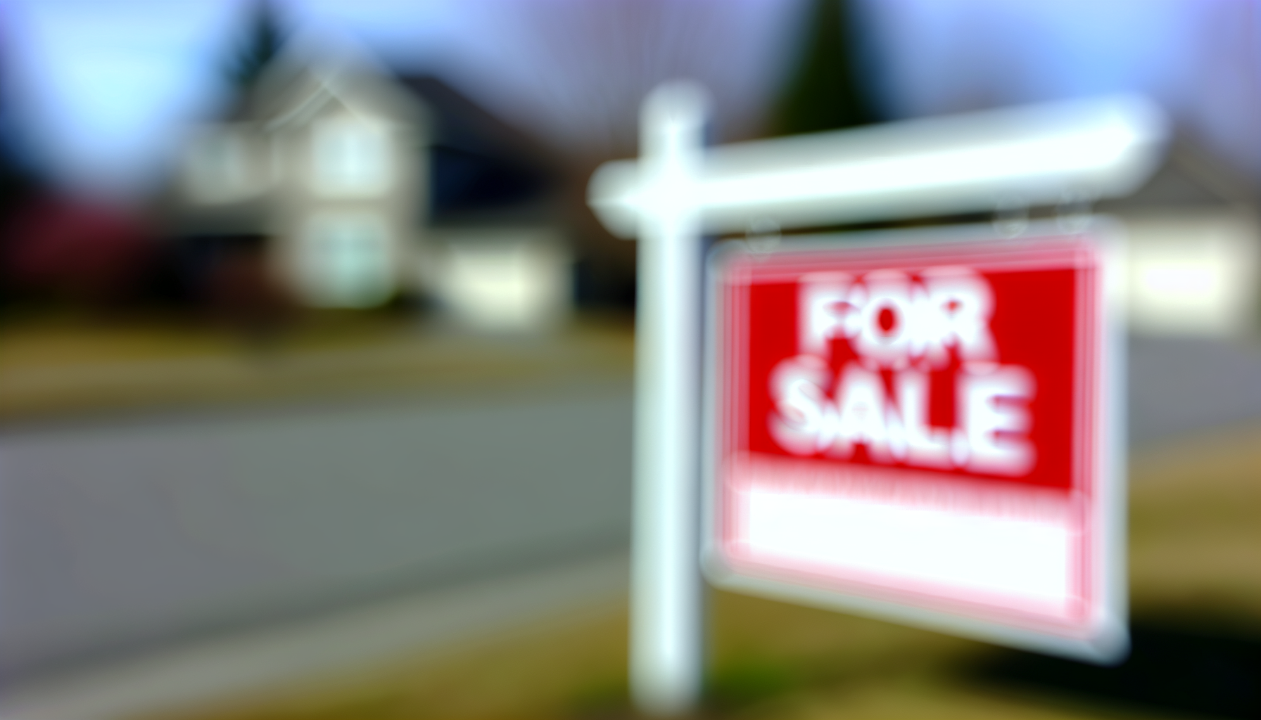 Real estate sign with blurred background